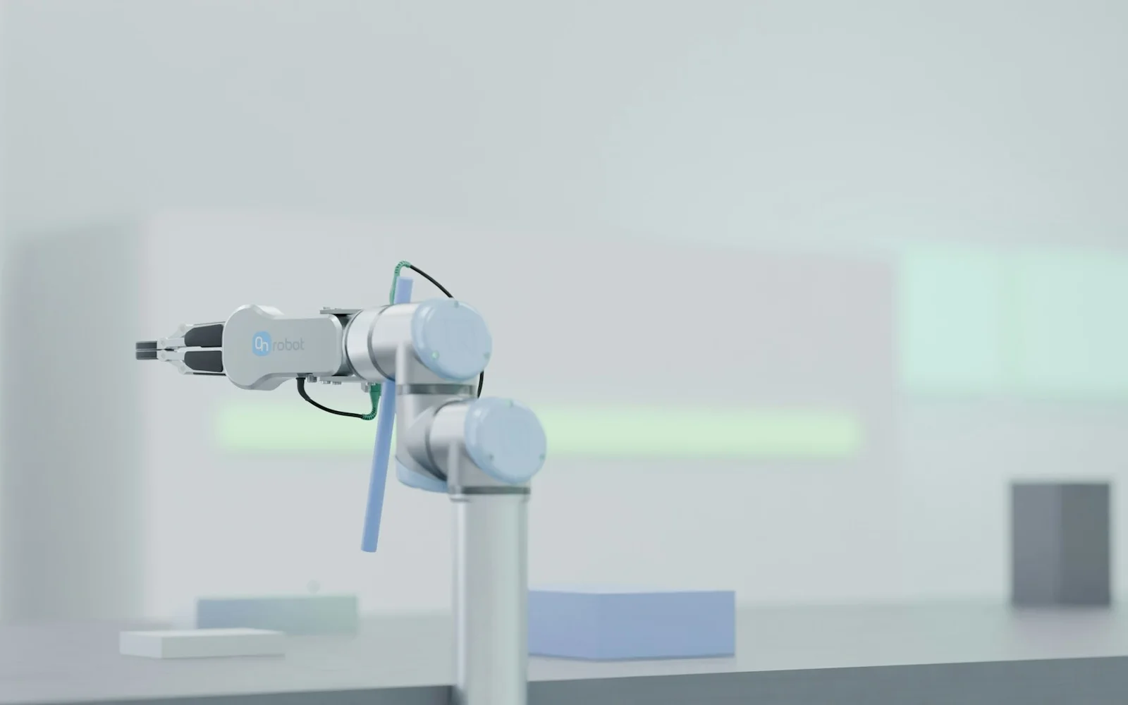 Vision-guided robotic arm sorting industrial objects in a controlled laboratory